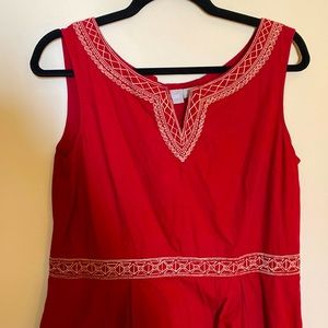 Red sleeveless dress with gold embroidery